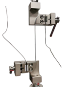 {{photo.Alt || photo.Description || 'Захваты типа "Улитка" для испытания на растяжение тонкой проволоки, нитей до 5 кН'}}