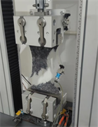 {{photo.Alt || photo.Description || 'Зажимы тисочного типа для испытаний на растяжение геотекстильного материала до 5кН, 10 кН'}}